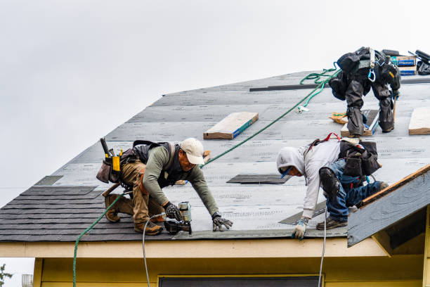 Professional Gutter Installation technician working in Mason, KY